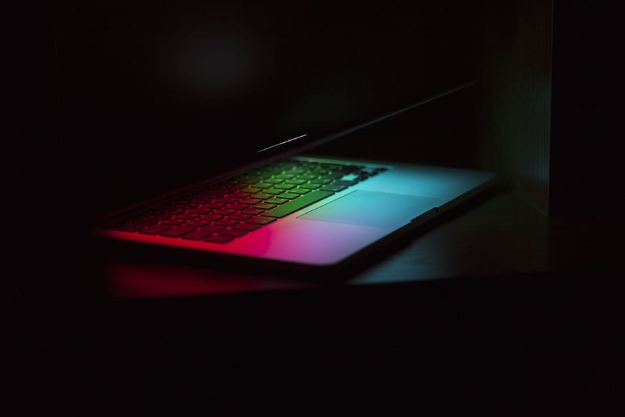 silver laptop computer, MacBook Pro, closeup photography, turned on HD wallpaper