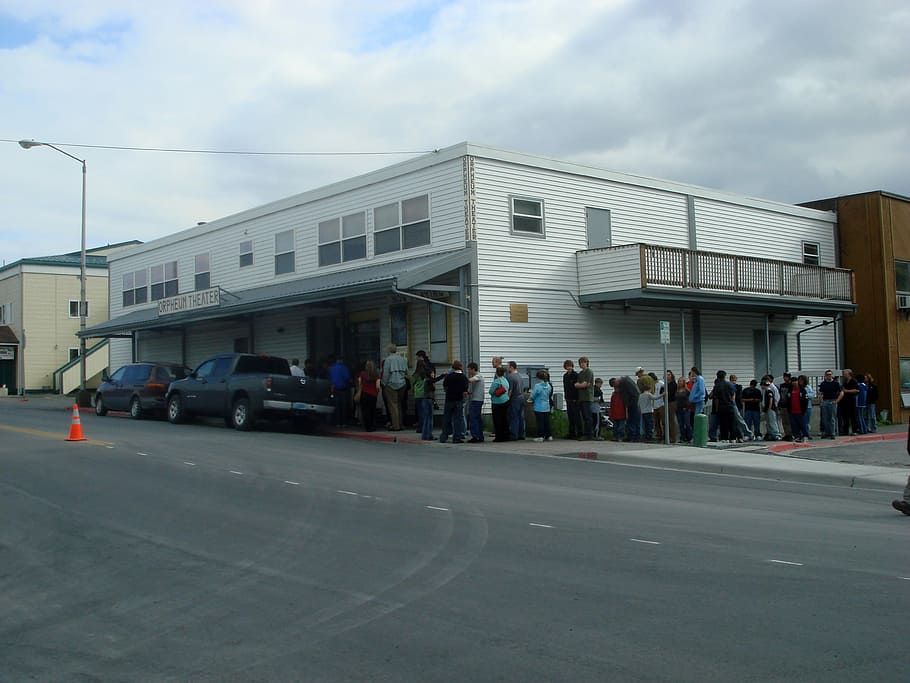Customers line up in front of the Orpheum Theater in Kodiak, Alaska HD wallpaper