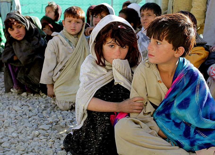 group of children in syria, afghanistan, girl, boy, poverty, 2010