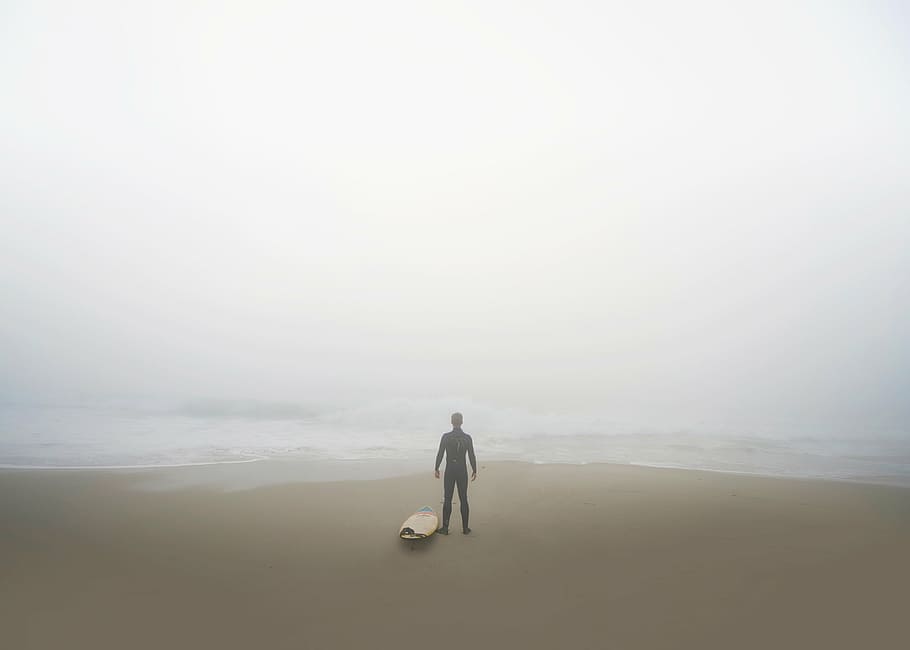 person standing at shoreline near white surfboard, sea, ocean HD wallpaper