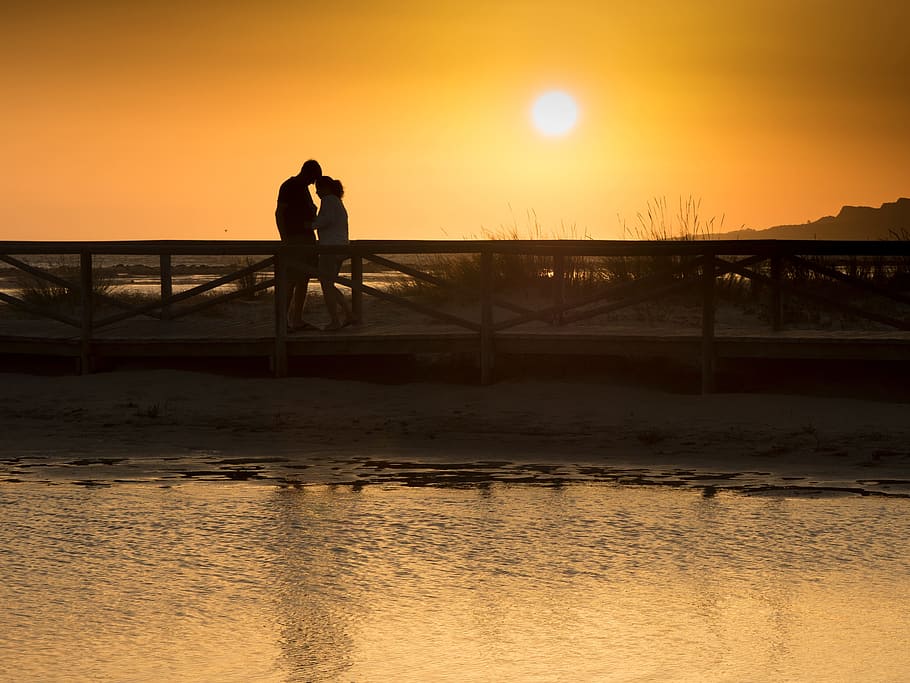 man and woman standing on wooden dock during sunset, love, dawn HD wallpaper