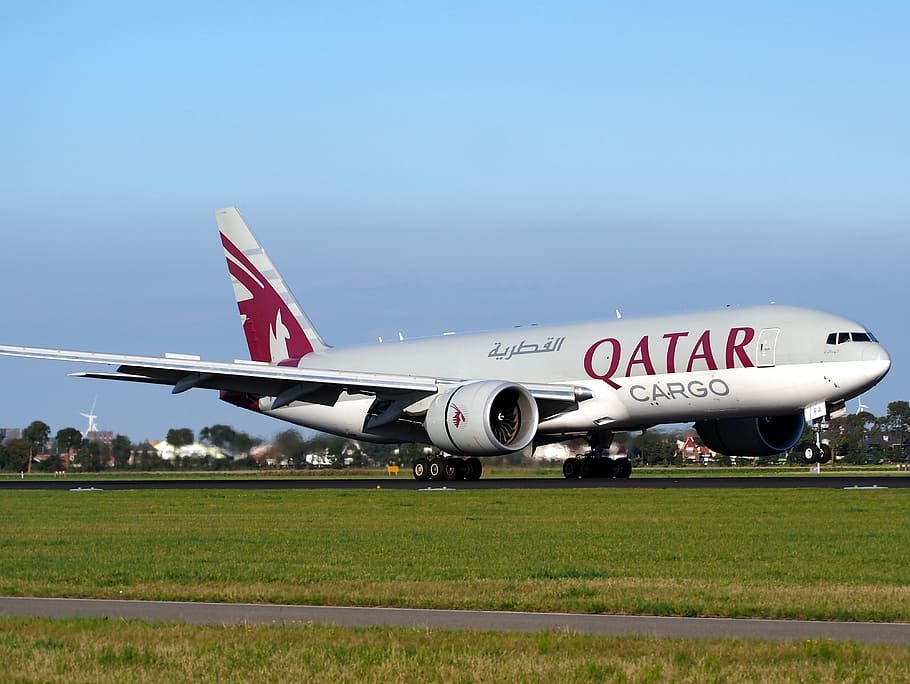 gray Qatar Cargo airliner land on ground, qatar airways, boeing 777