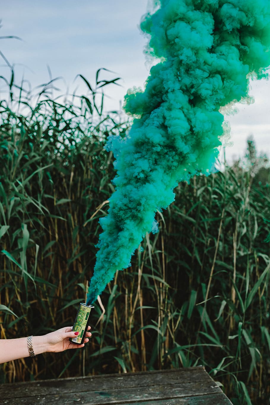 Green smoke bomb, abstract, background, outdoor, nature, human Hand