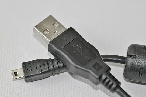 black USB to micro USB cable on white textile, charging cable HD wallpaper