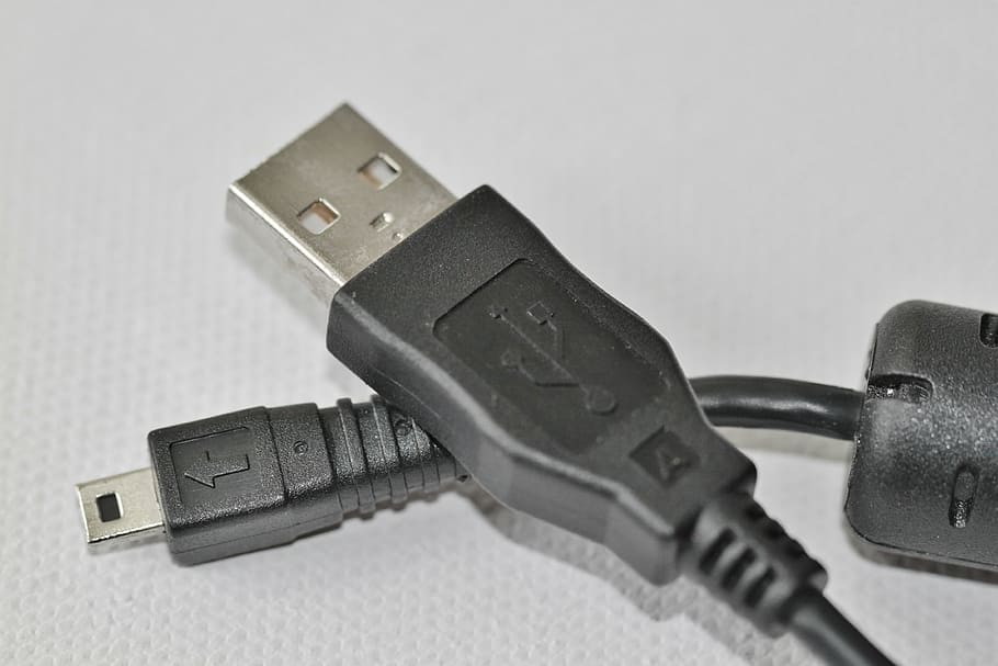 black USB to micro USB cable on white textile, charging cable HD wallpaper