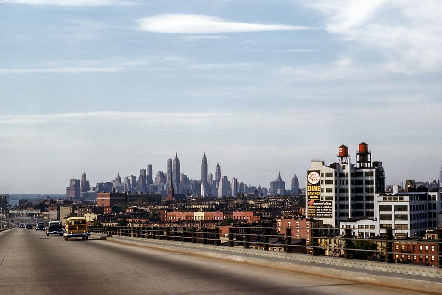 landscape photo of road near buildings during daytime, cars HD wallpaper