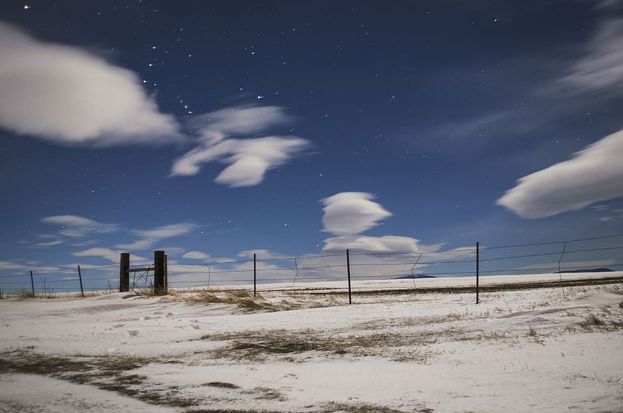 gray metal fence on desert under white cloudy sky, black steel fence under white clouds HD wallpaper