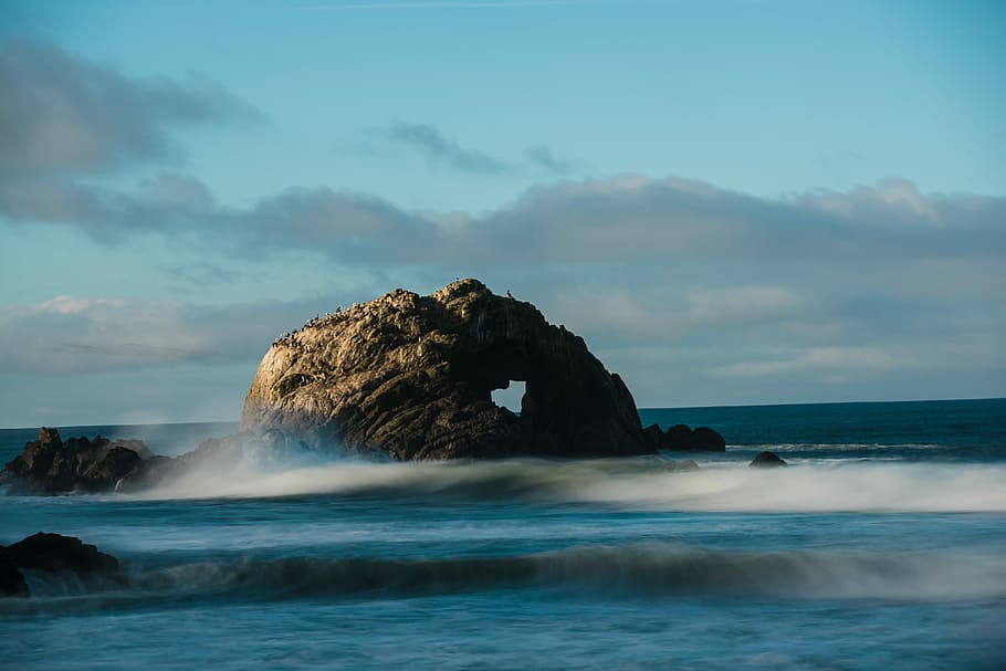brown rock formation near the sea, rock formation on sea with waves at daytime HD wallpaper