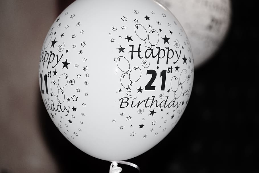 white and black happy 21st birthday printed balloon close-up photography