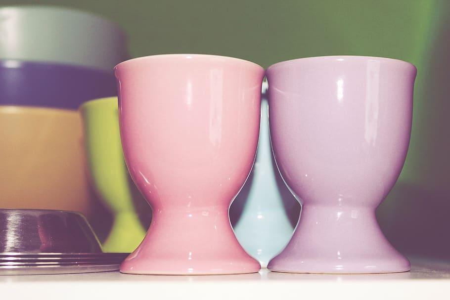 closeup photo of two pink ceramic cups, egg cups, tableware HD wallpaper