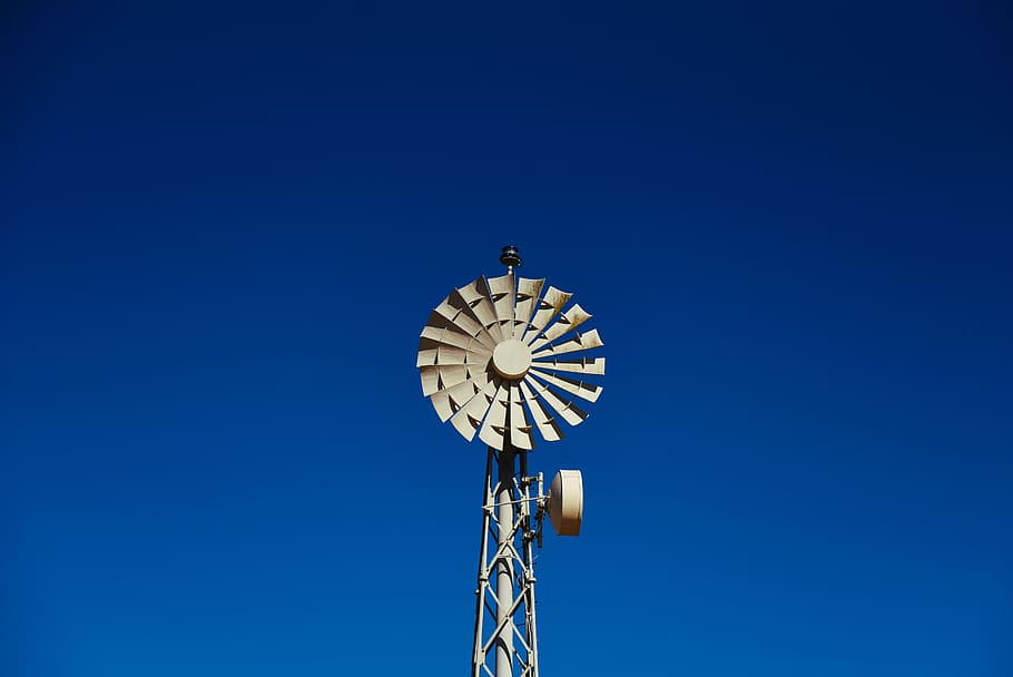low angle photography beige wind turbine, white water mill under blue sky HD wallpaper