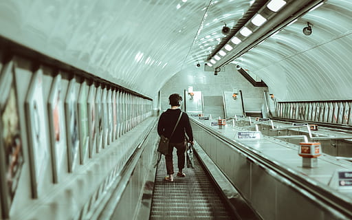 person walking on escalator, person on escalator carrying bag HD wallpaper