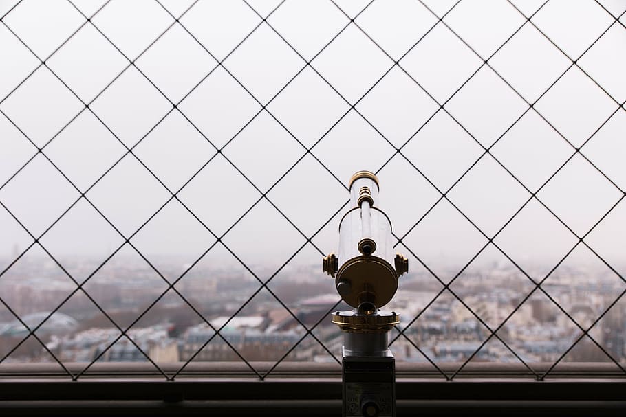 gray and brown telescope besides chain link fence at daytime HD wallpaper
