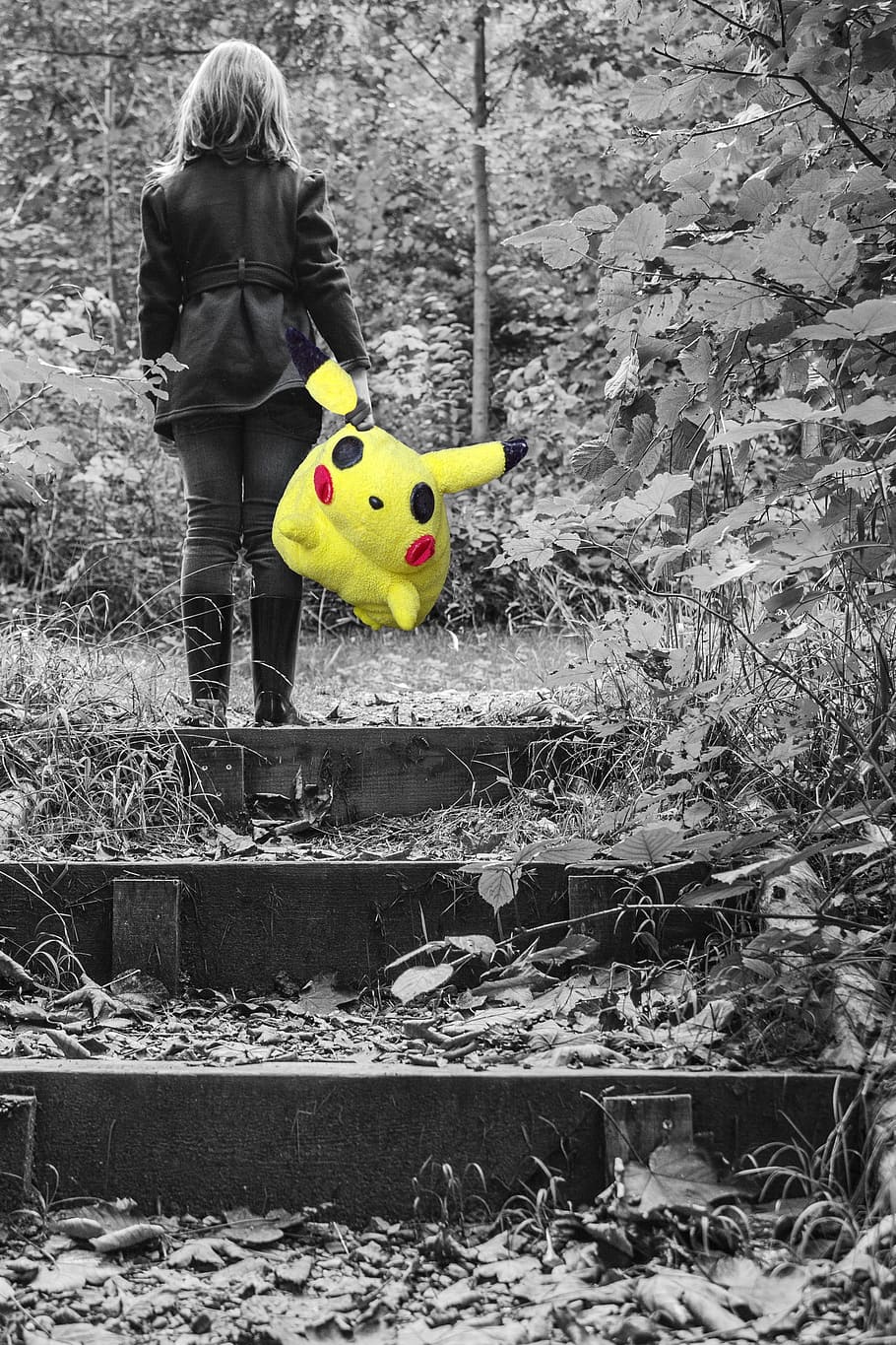 woman carrying pikachu plush toy, little girl, pokemon, lonely