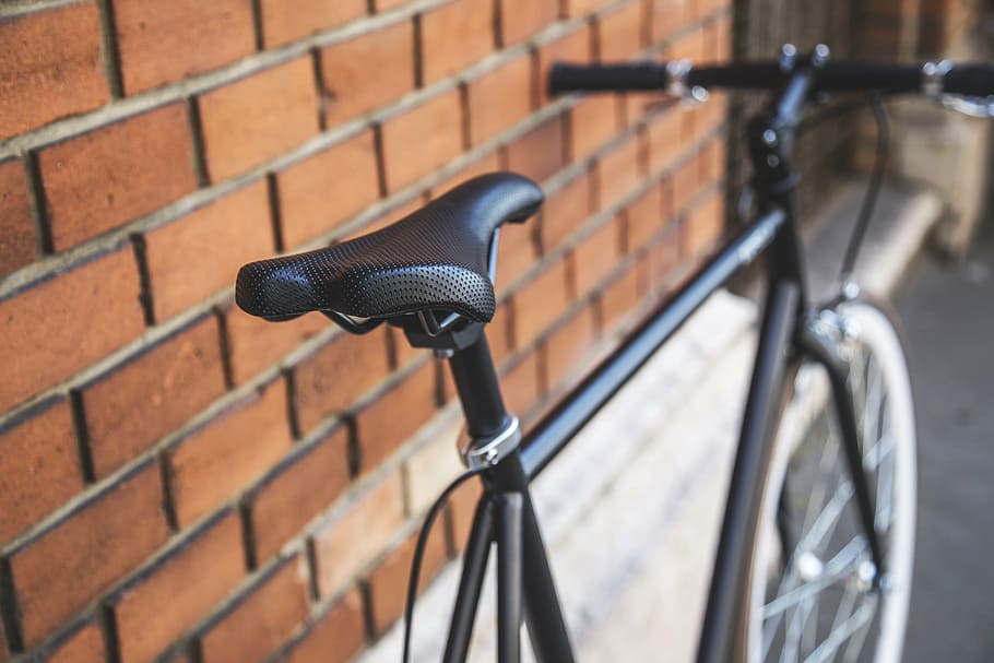 black mountain bike parked beside wall, rigid, brown, brick HD wallpaper