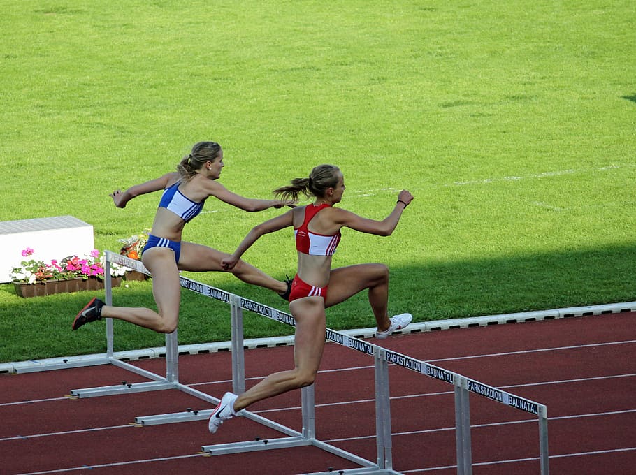 woman jumping on hurdle during daytime, athletics, women, hurdles, HD wallpaper
