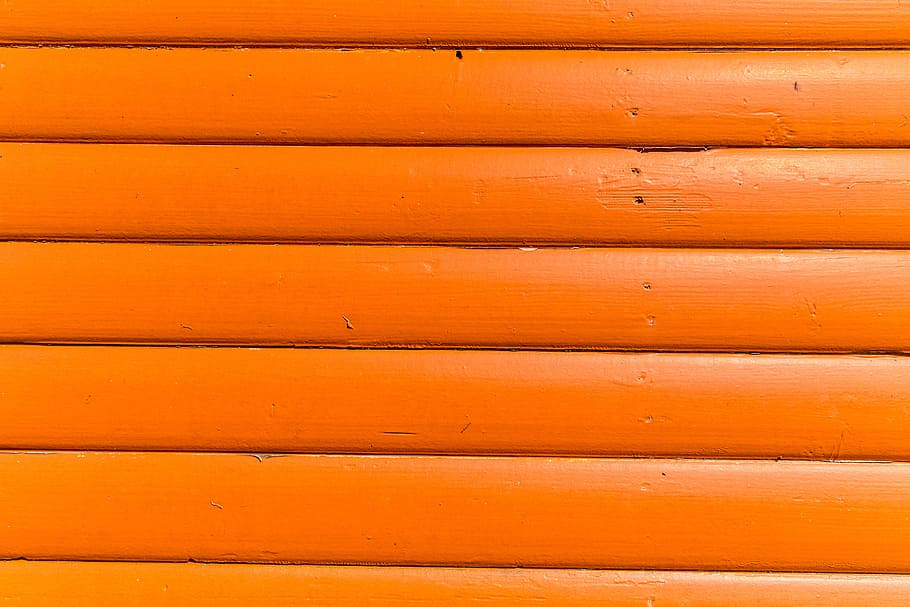 Close-up texture shot of bright orange wood panels. Image captured with a Canon DSLR HD wallpaper