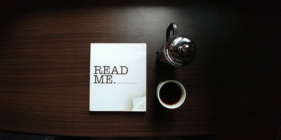 Read Me, coffee filled cup beside carafe, table, book, page, reading HD wallpaper