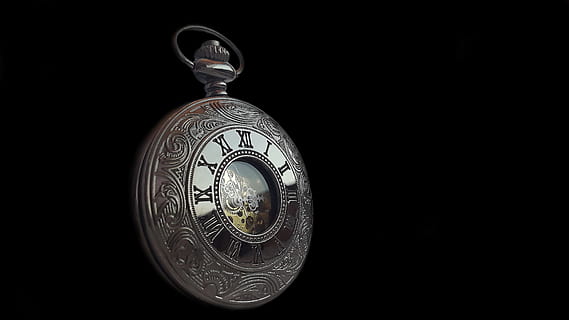 round silver-colored framed pocket watch with black background HD wallpaper