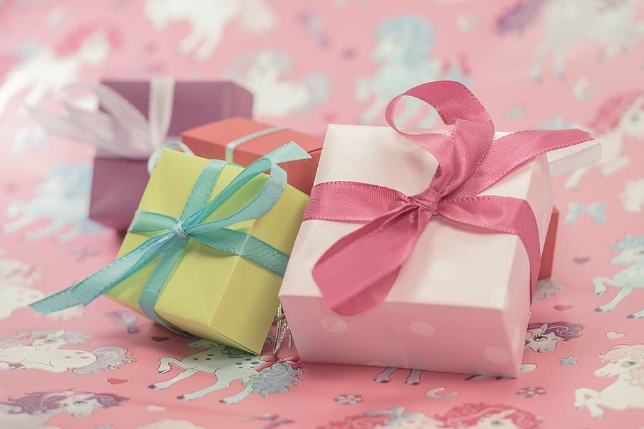 four assorted-color gift boxes on pink surface, made, package, HD wallpaper