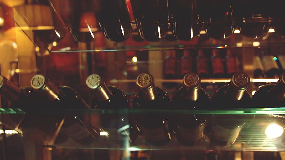 selective focus photography of bottles on shelf, glass, clear HD wallpaper