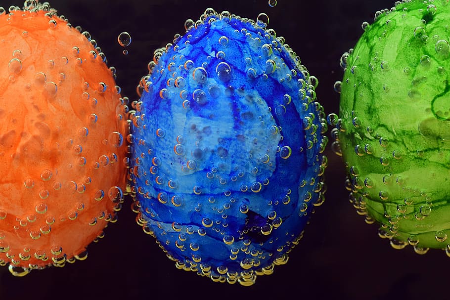 three orange, blue, and green decorative balls with water bubbles vector art HD wallpaper
