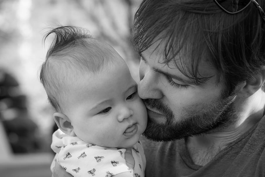 grayscale photography of man kissing baby, father, dad, parent