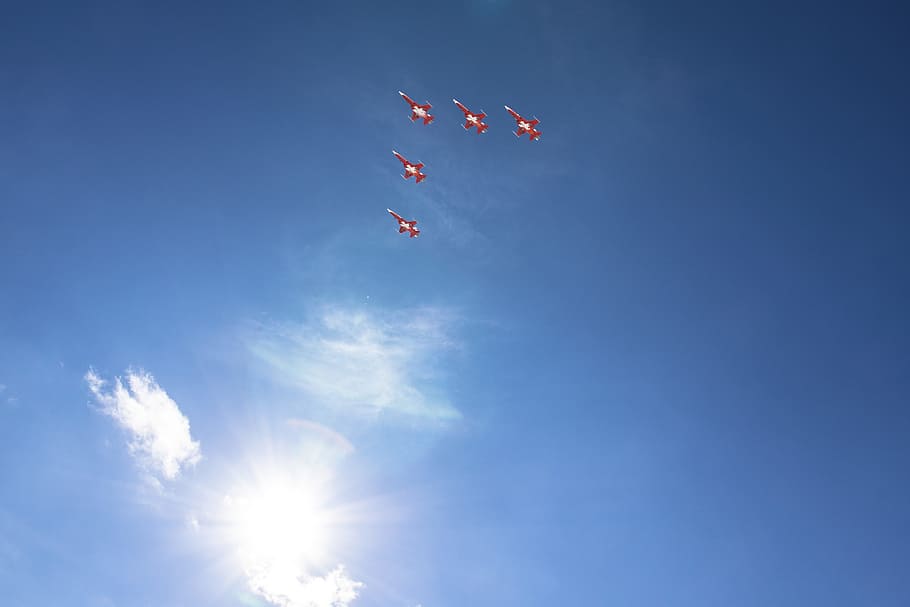 fighter jets forming flying V, five red jetplane under white and sky during daytime HD wallpaper