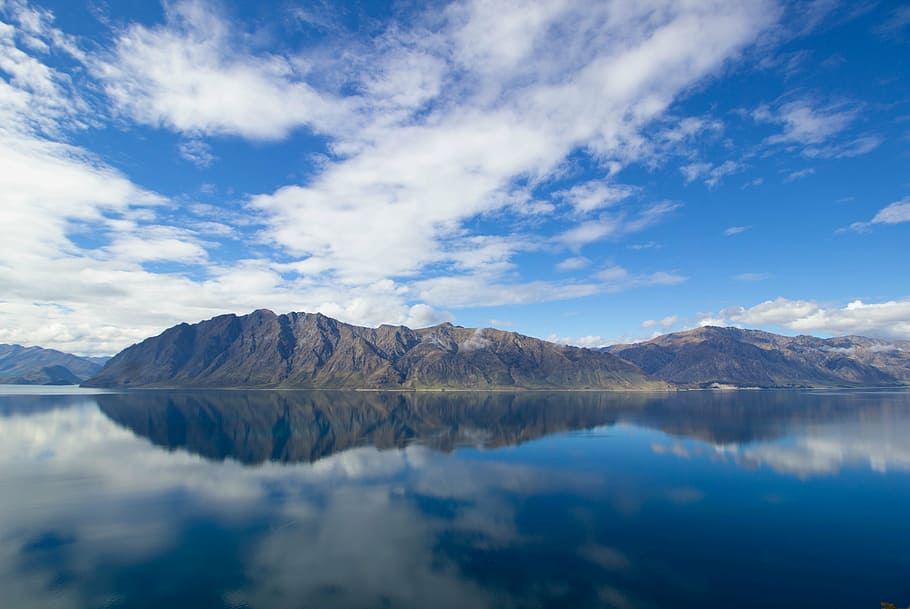 mountain reflecting on calm lake, photo, brown, reflection HD wallpaper