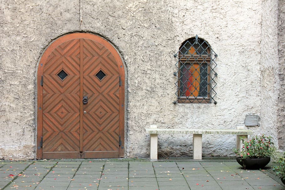 closed brown wooden door near the white concrete bench, building HD wallpaper