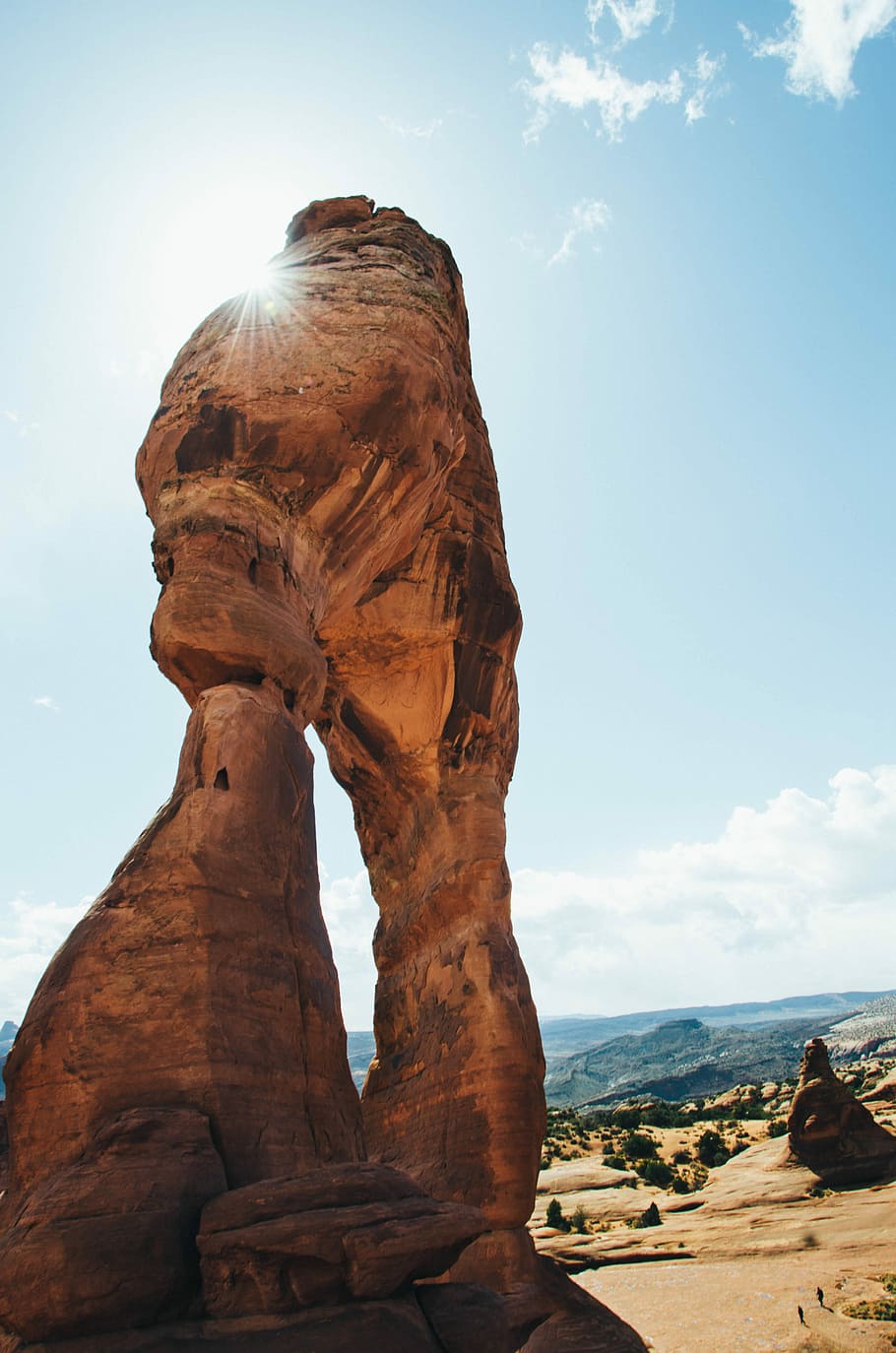 brown boulder near canyon under blue sky, low angle photo of brown boulder HD wallpaper
