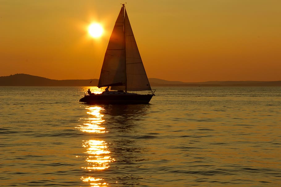 brown and white boat on body of water during sunset, sailing boat HD wallpaper