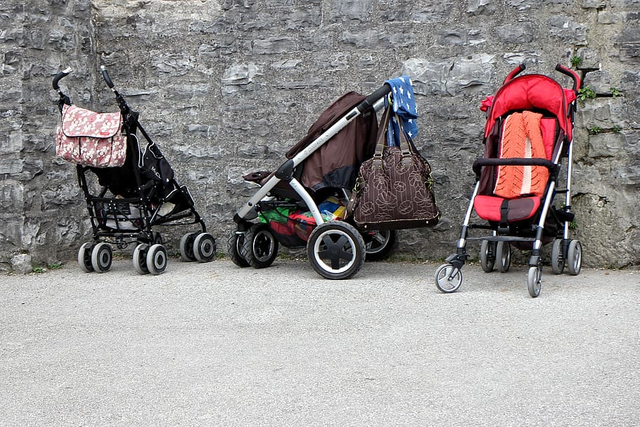 three empty strollers beside wall, buggies, child, sun buggy