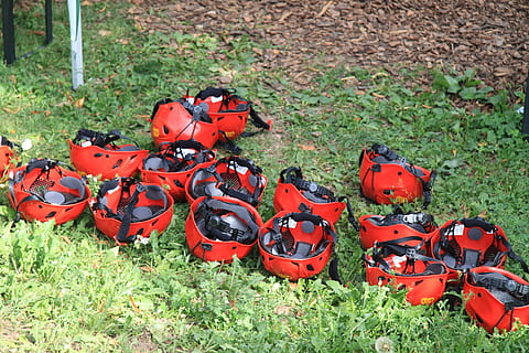 helmets, rafting, red, protections, elmo, extreme, grass, plant HD wallpaper