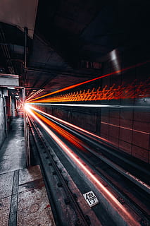 red and gray light crossing on road under tunnel in timelapse photography, time lapse photo of train in train station HD wallpaper