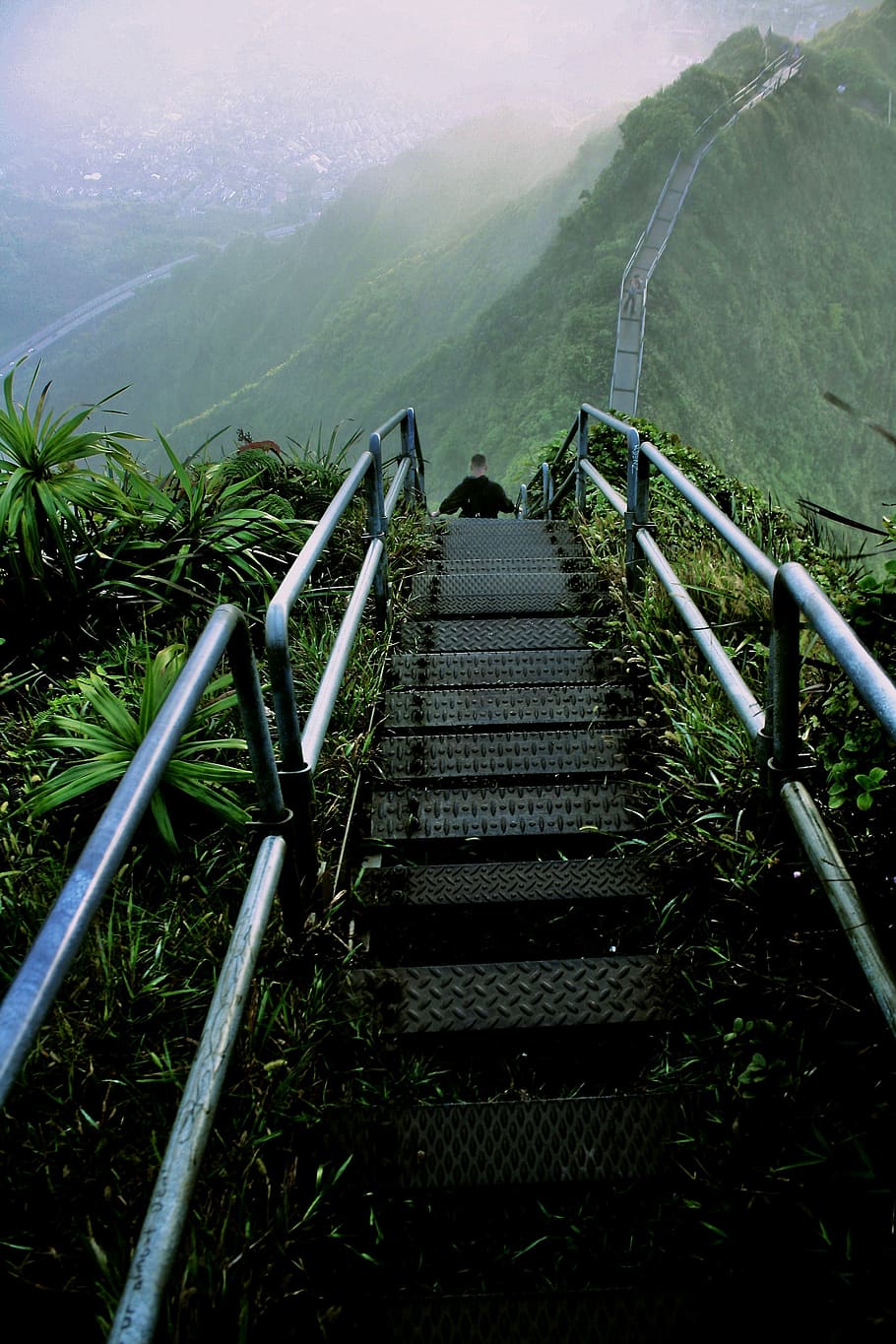 man walking on gray ladder on hill, man walking on stair of mountain HD wallpaper