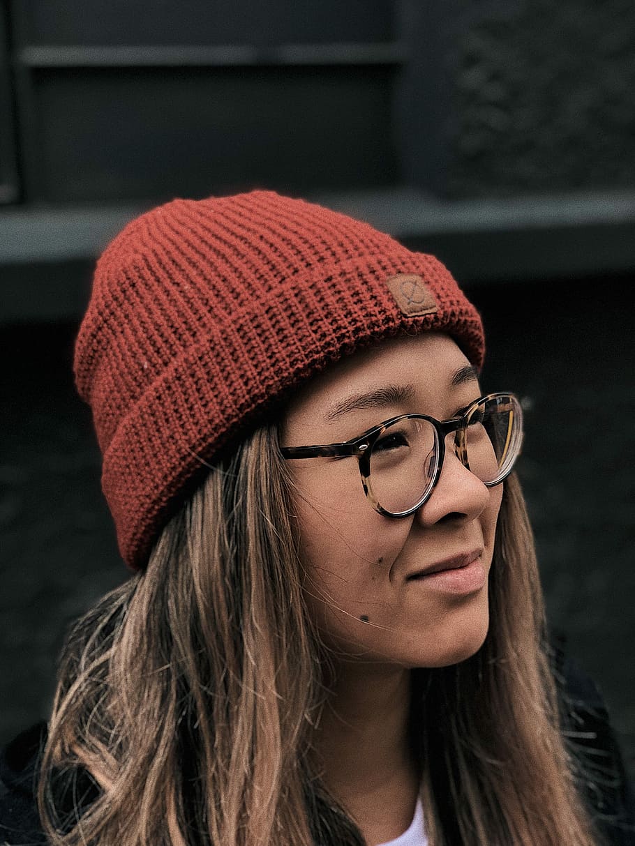 woman wearing knit cap and eyeglasses, close-up photography of woman wearing red knit cap and eyeglasses, HD wallpaper