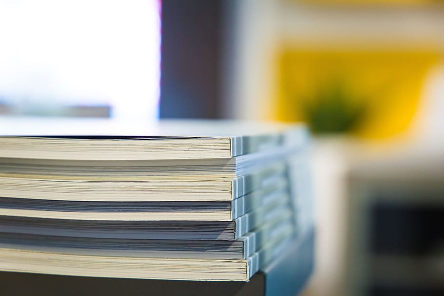 selective focus photo of pile of books inside room, catalogs, HD wallpaper