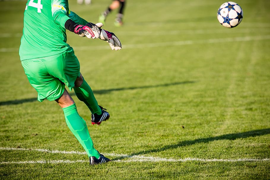 goal keeper wearing green jersey, door husband, committee, goalkeeper