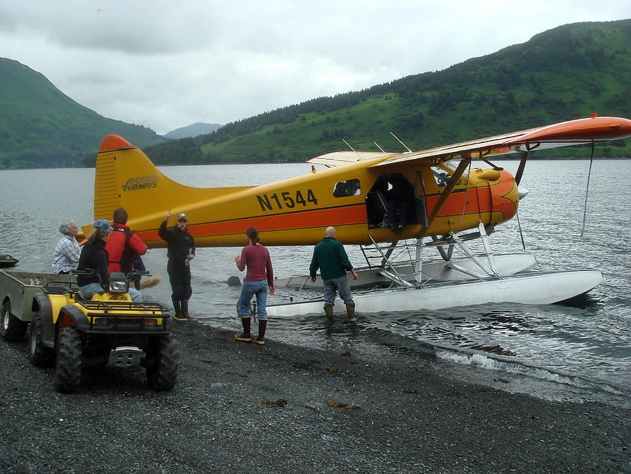 Floatplane dropping off Guests in the Wilderness near Kodiak, Alaska HD wallpaper