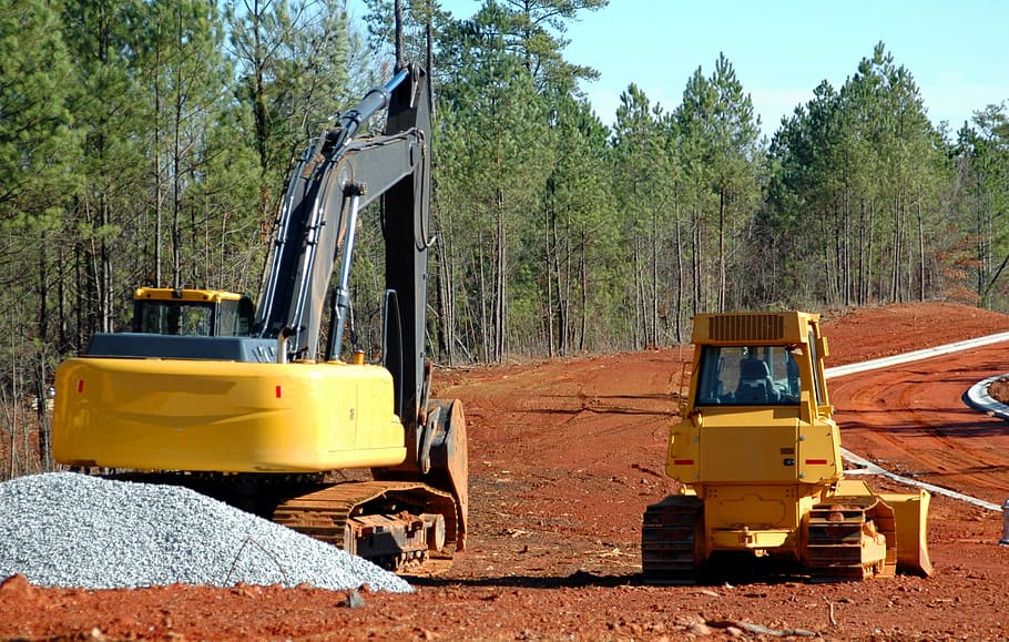 yellow excavator on dirt road, heavy equipment, bulldozer, backhoe