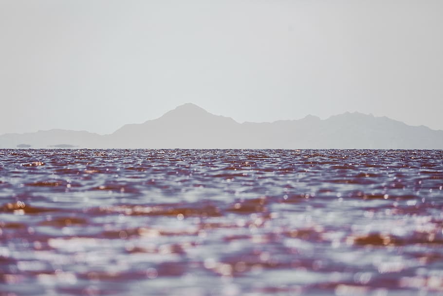 body of water in distant of mountains, sea, ocean, waves, nature HD wallpaper