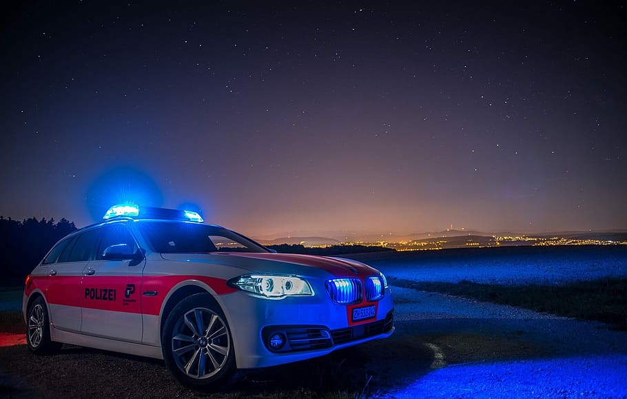 photo of white BMW police car, zurich cantonal police, switzerland