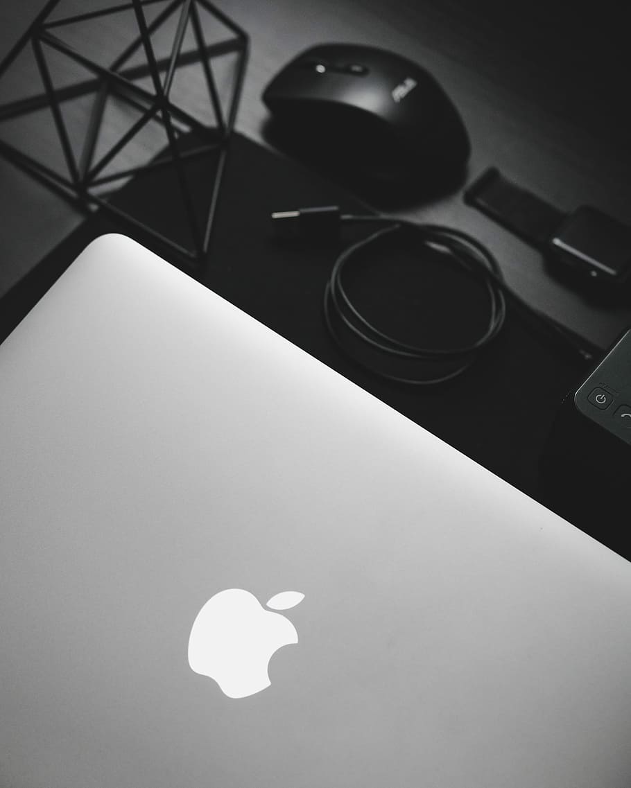 MacBook near black computer mouse, white MacBook beside black USB cable HD wallpaper