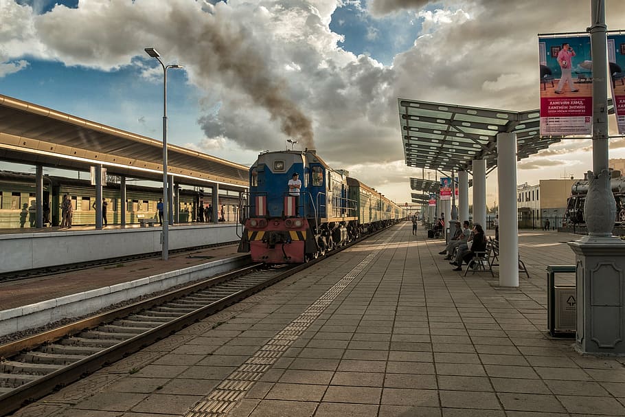 blue and red train at station during daytime, landscape, mongolia