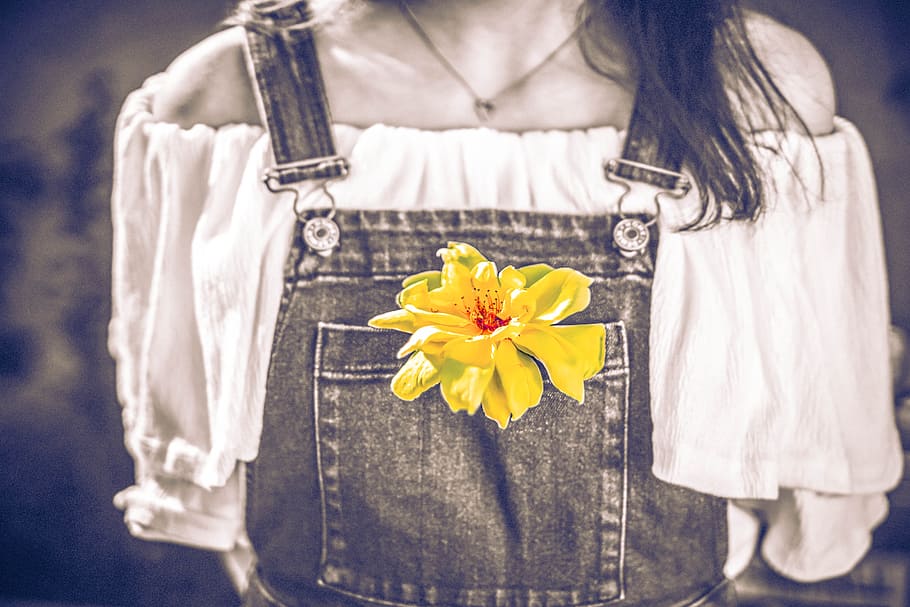 selective color photo of yellow petaled flower on person's romper, HD wallpaper