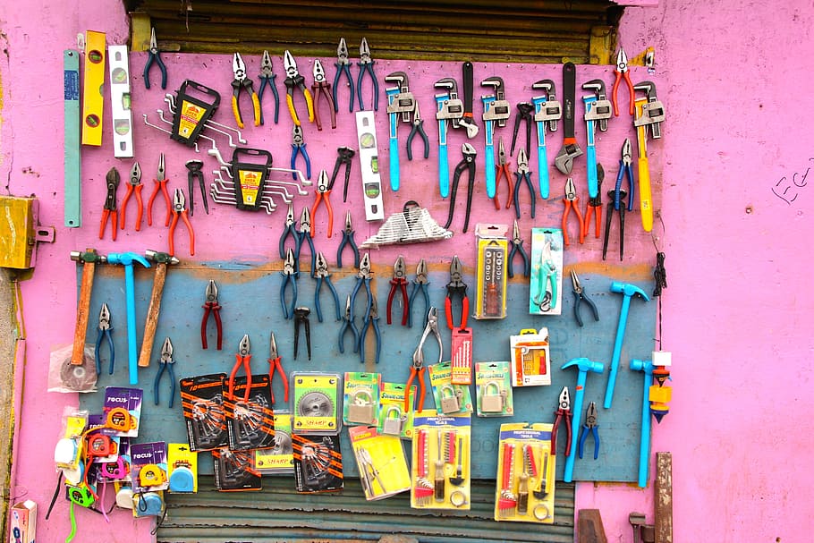 assorted hand tools, craft, pliers, workshop, hanging, no people