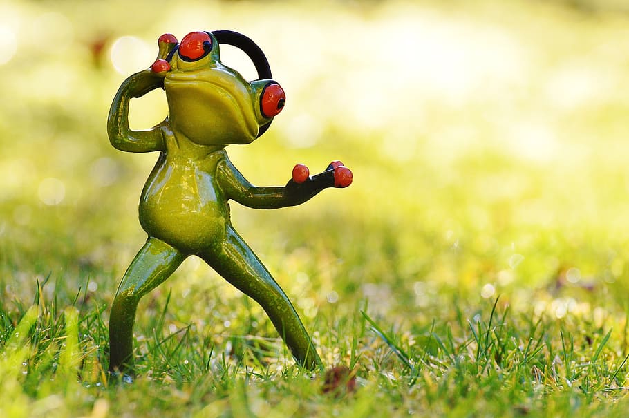 green frog figurine on green grass at daytime, meadow, headphones, HD wallpaper