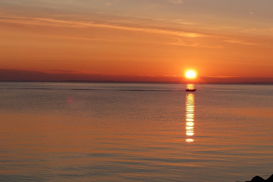sunset, back light, orange, boot, mirroring, evening, sky, sea HD wallpaper