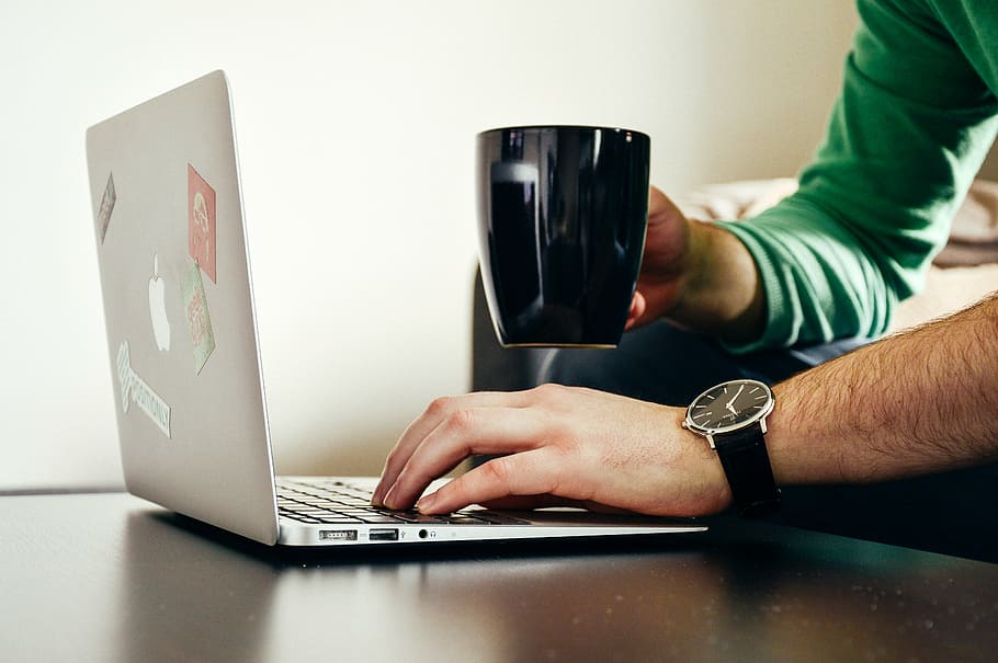 apple, computer, laptop, macbook, man, mug, person, wristwatch HD wallpaper